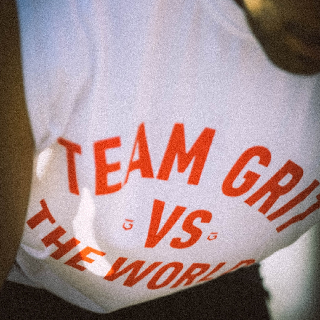 Camiseta Tank Team GRIT VS The World Blanca